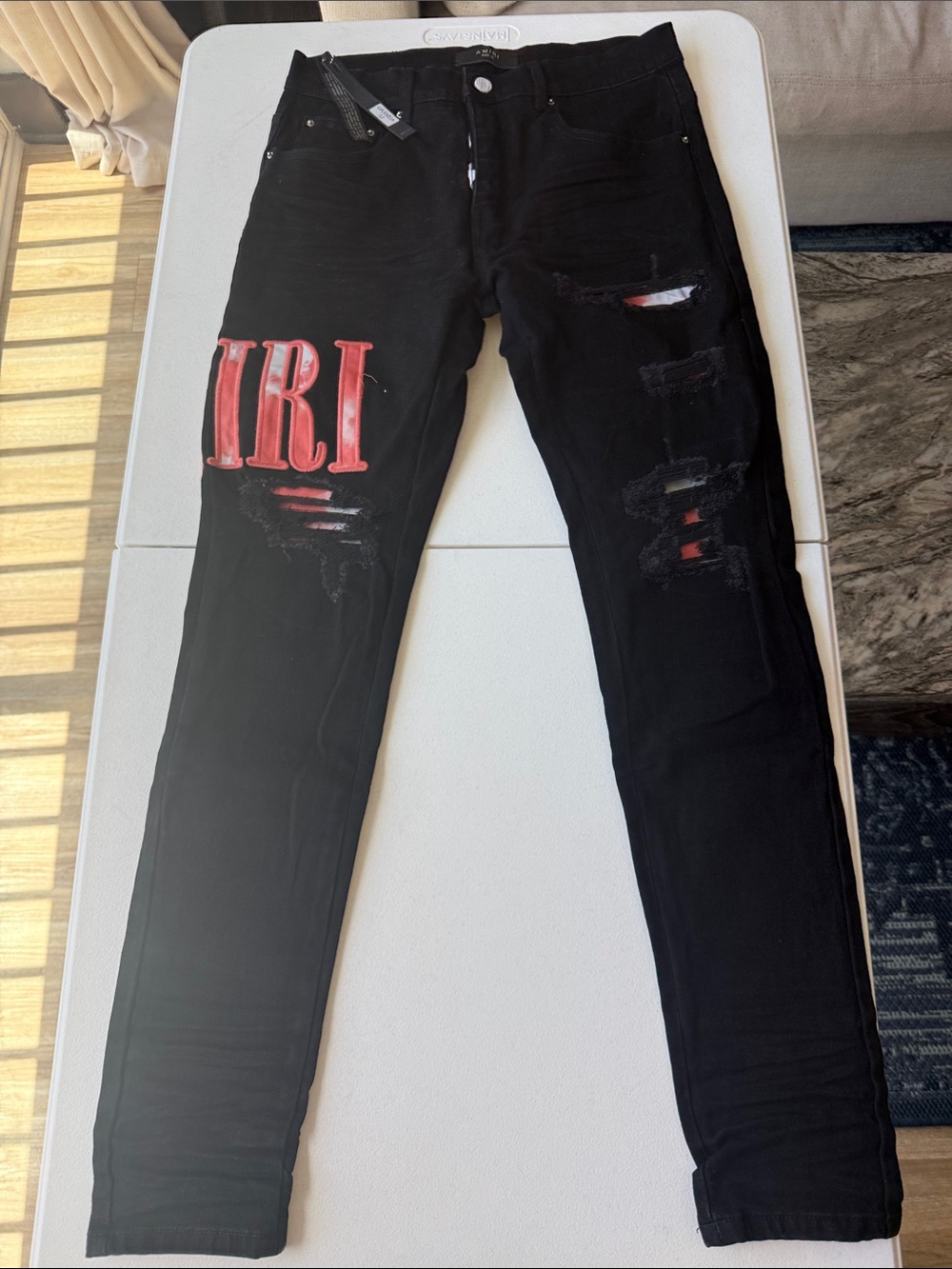 AMIRI Black Skinny Jeans with Red Lettering